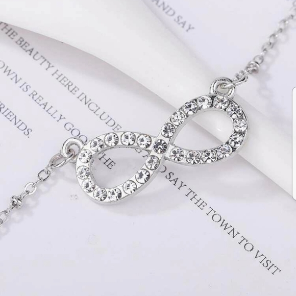 Jewelry - 3/15$ Rhinestone Infiniti Pendant Necklace NWT